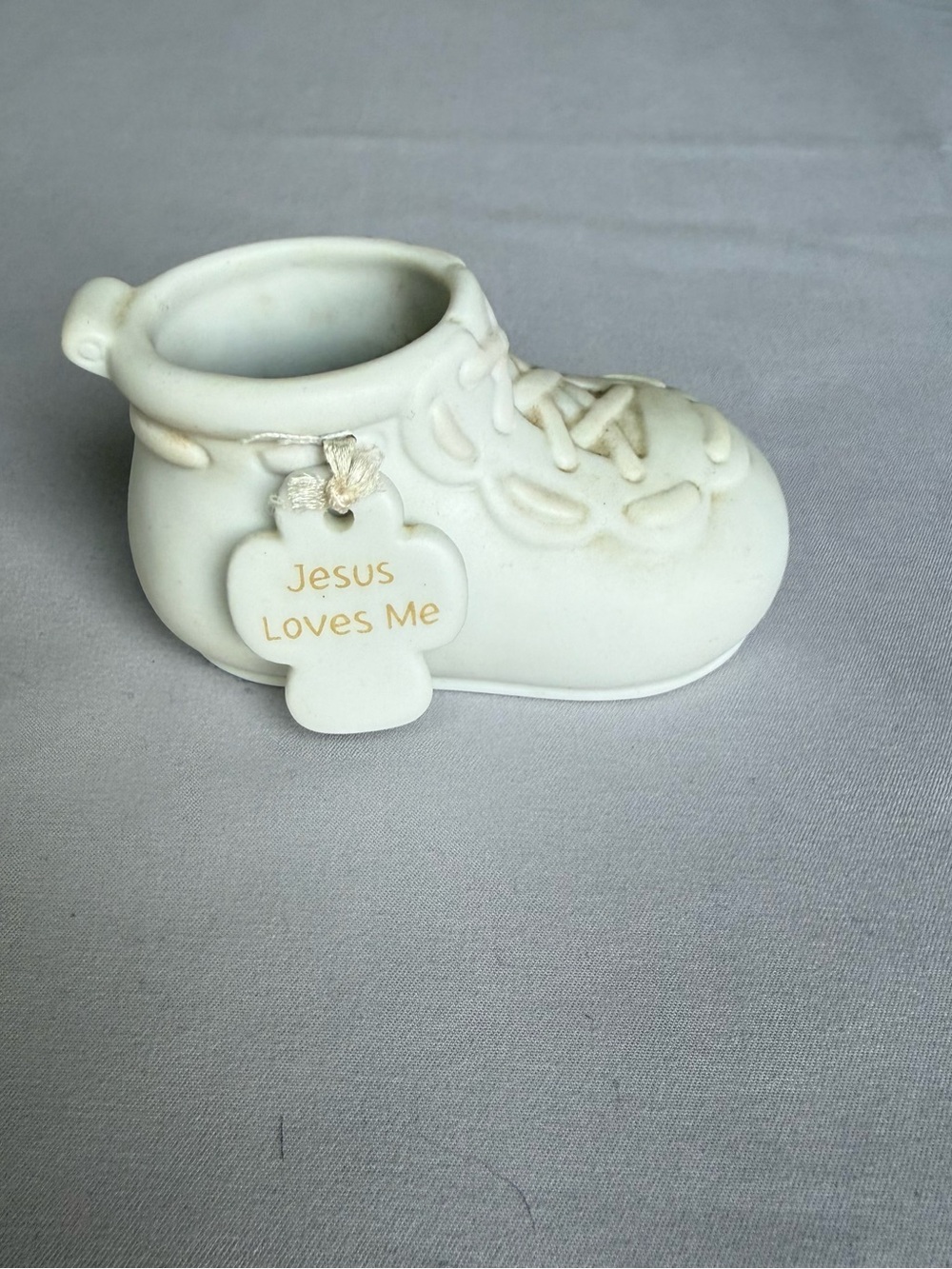 White Baby Shoe Keepsake with "Jesus Loves Me" Tag